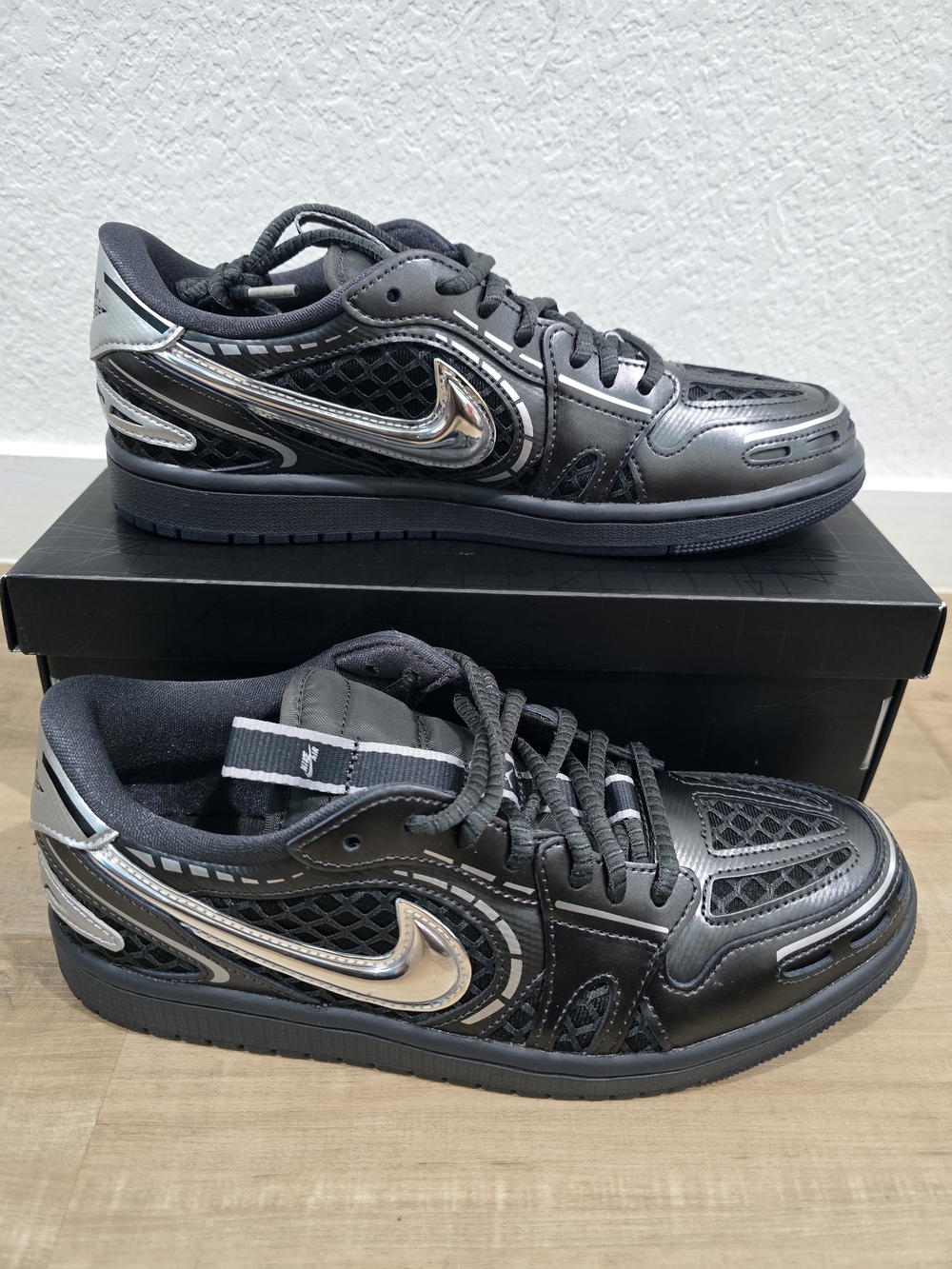 Nike Air Jordan 1 Women's Metallic Black Low-Top Sneakers